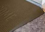 Tan 1.5 inch Welcome threshold ramp.